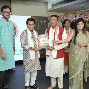 Astrologer Shree Somok receiving Award by Mr Rudranil Ghosh